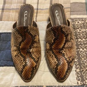 Snake skin mules, 2 1/4 in heels. Worn twice. Purchased at Nordstrom. Like new.